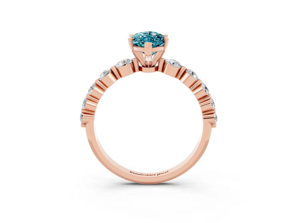 Rose gold Marquise Cut Solitaire Blue Topaz Ring with Pave Band and Four-Prong Setting