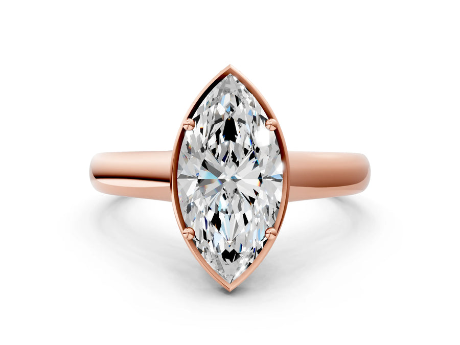 Rose gold Marquise Cut Solitaire Diamond Engagement Ring with Four-Prong Setting and Tapered Band