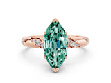 Rose gold Marquise Cut Solitaire Diamond Engagement Ring with Twisted Pave Band and Four-Prong Setting