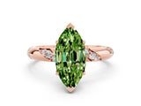 Rose gold Marquise Cut Solitaire Diamond Engagement Ring with Twisted Pave Band and Four-Prong Setting