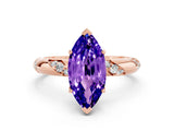 Rose gold Marquise Cut Solitaire Diamond Engagement Ring with Twisted Pave Band and Four-Prong Setting