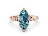 Rose gold Marquise Cut Solitaire Diamond Engagement Ring with Twisted Pave Band and Four-Prong Setting
