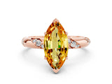 Rose gold Marquise Cut Solitaire Diamond Engagement Ring with Twisted Pave Band and Four-Prong Setting