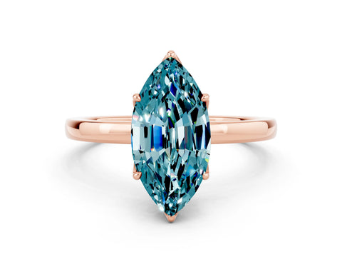 Rose gold Marquise Cut Solitaire Diamond Ring with Thin Band and Four-Prong Setting
