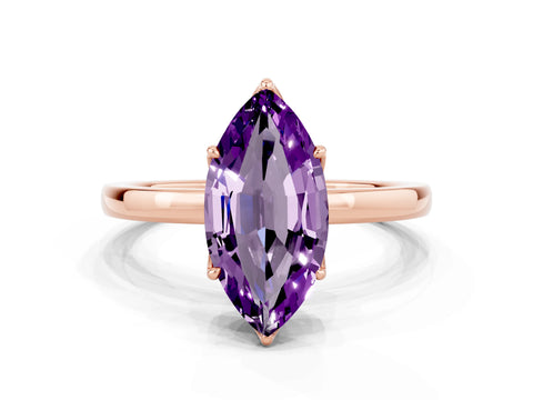 Rose gold Marquise Cut Solitaire Diamond Ring with Thin Band and Four-Prong Setting