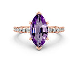 Rose gold Marquise Cut Solitaire Diamond with Pavé Band and Four-Prong Setting
