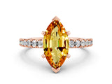 Rose gold Marquise Cut Solitaire Diamond with Pavé Band and Four-Prong Setting