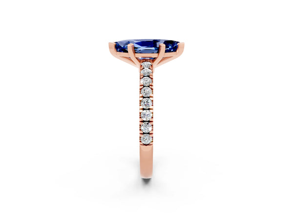 Rose gold Marquise Cut Solitaire Blue Sapphire with Pavé Band and Four-Prong Setting