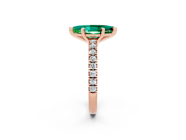 Rose gold Marquise Cut Solitaire Emerald with Pavé Band and Four-Prong Setting