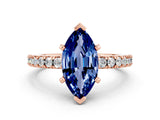 Rose gold Marquise Cut Solitaire Diamond with Pavé Band and Four-Prong Setting