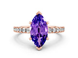 Rose gold Marquise Cut Solitaire Diamond with Pavé Band and Four-Prong Setting