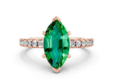 Rose gold Marquise Cut Solitaire Diamond with Pavé Band and Four-Prong Setting