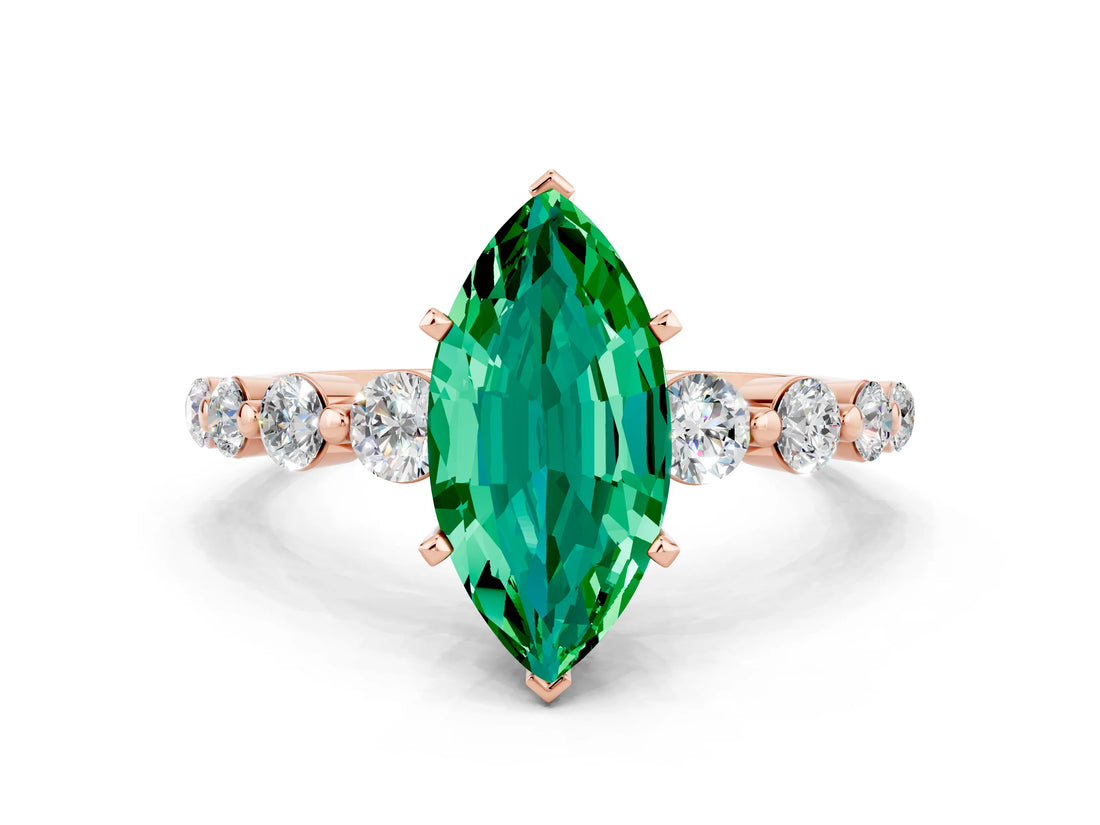 Rose gold Marquise Cut Solitaire Emerald Ring with Pave Band and Four-Prong Setting