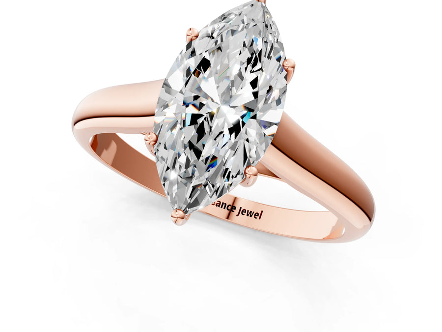 Rose gold Marquise Cut Solitaire Engagement Ring with Tapered Band and Four-Prong Setting