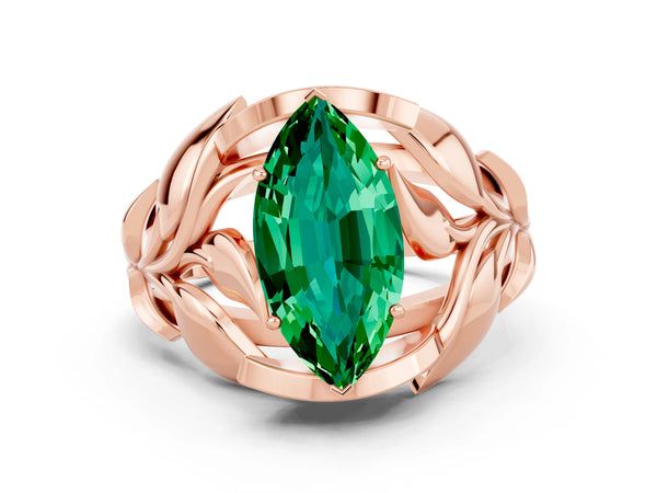 Rose gold Marquise Cut Emerald Leaf-Inspired Engagement Ring with Round Accents and Prong Setting