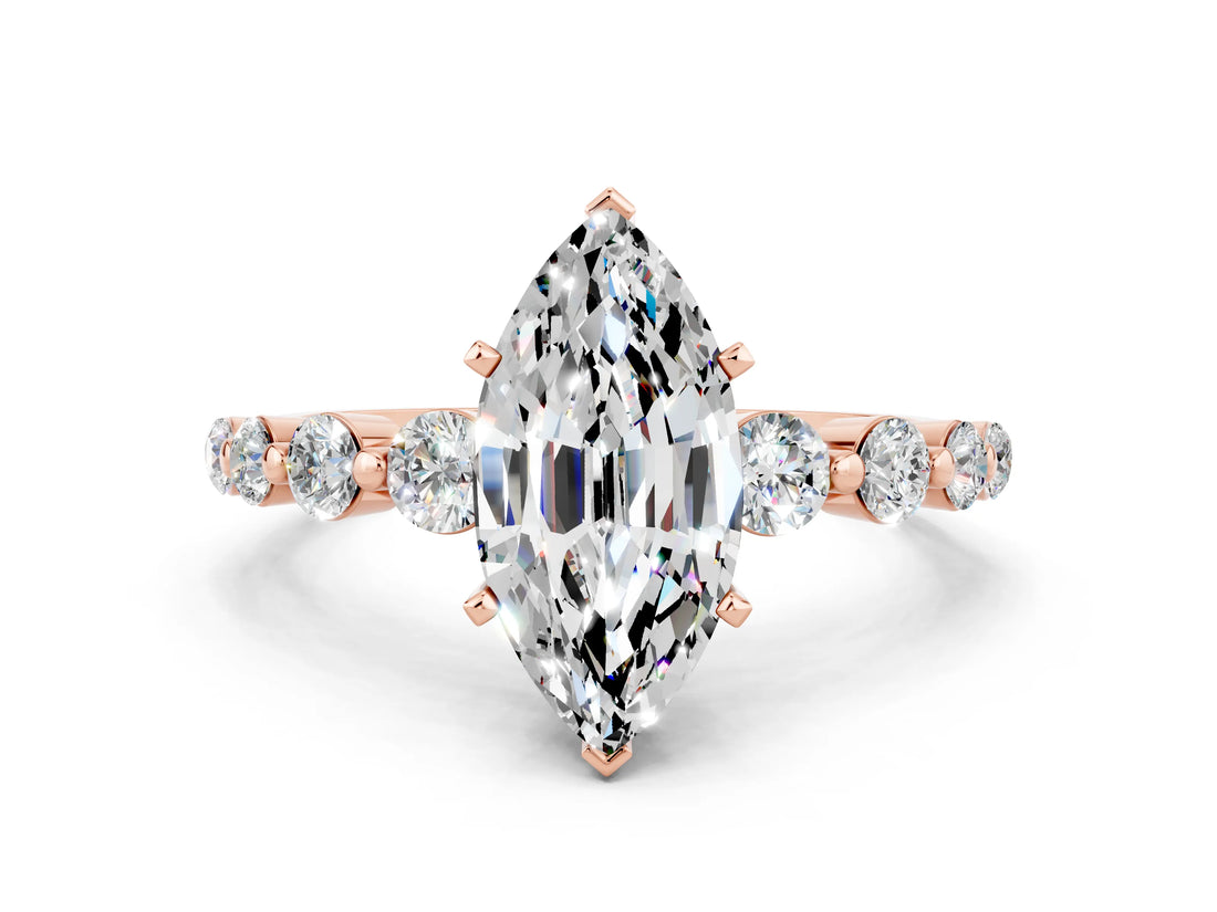 Rose gold Marquise Cut Solitaire Moissanite Ring with Pave Band and Four-Prong Setting