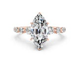 Rose gold Marquise Cut Solitaire Moissanite Ring with Pave Band and Four-Prong Setting
