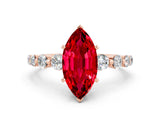 Rose gold Marquise Cut Solitaire Ruby Ring with Pave Band and Four-Prong Setting