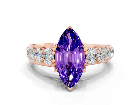Rose gold Marquise Cut Tanzanite Engagement Ring with Pavé Band and Four-Prong Setting