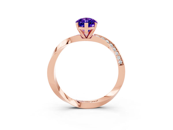 Rose gold Marquise Cut Tanzanite Engagement Ring with Side Stone Accents and Four-Prong Setting