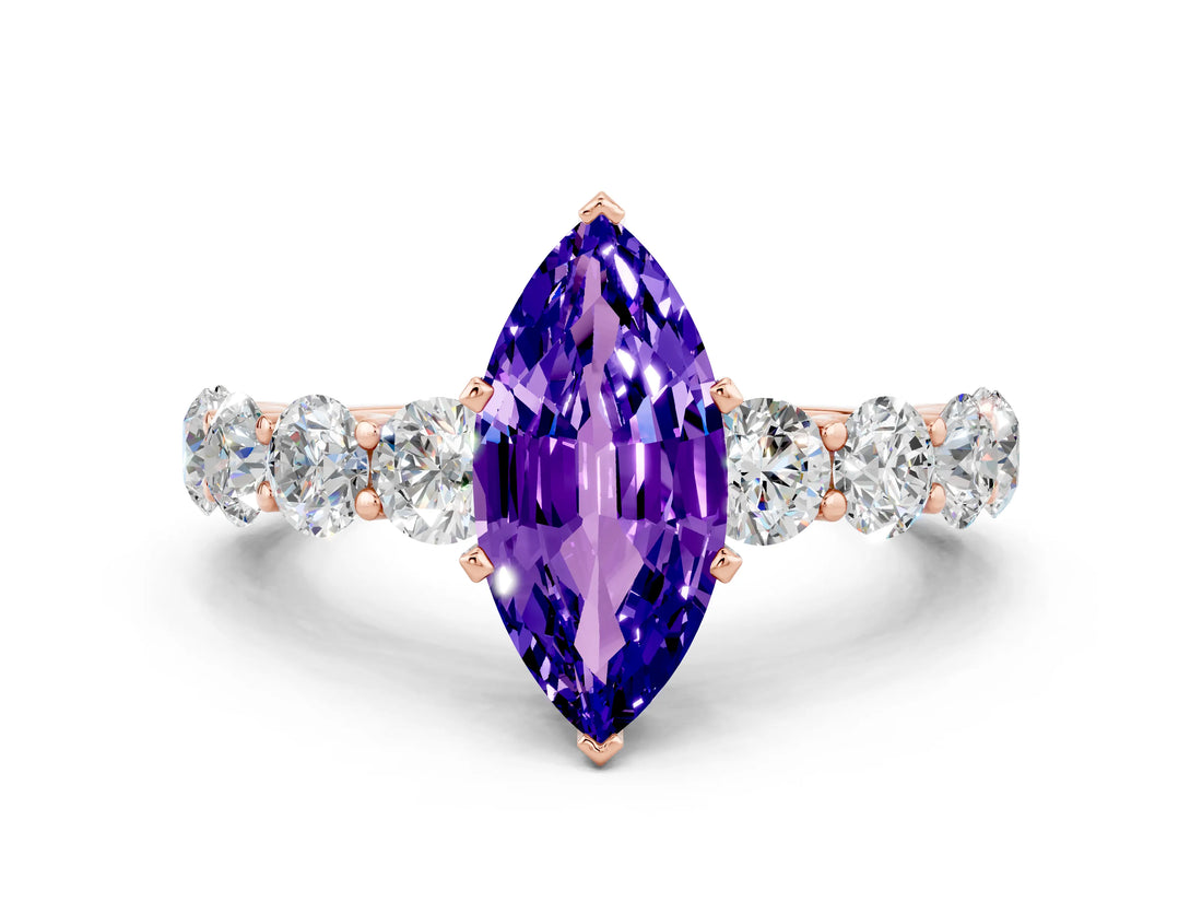 Rose gold Marquise Cut Tanzanite Prong Setting with Side Stones on a Pave Band