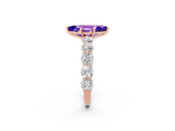 Rose gold Marquise Cut Tanzanite Prong Setting with Side Stones on a Pave Band
