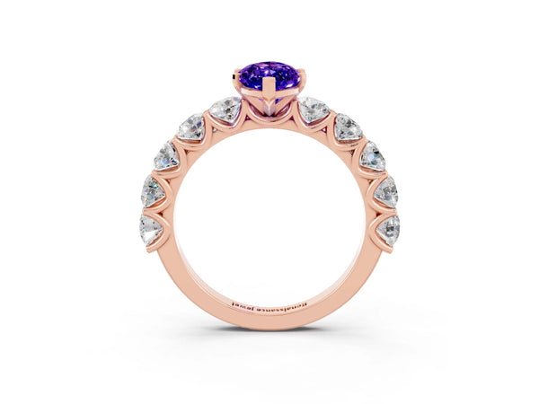Rose gold Marquise Cut Tanzanite Prong Setting with Side Stones on a Pave Band