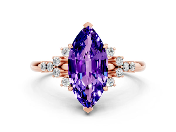 Rose gold Marquise Cut Tanzanite Ring with Side Stones and Four-Prong Setting