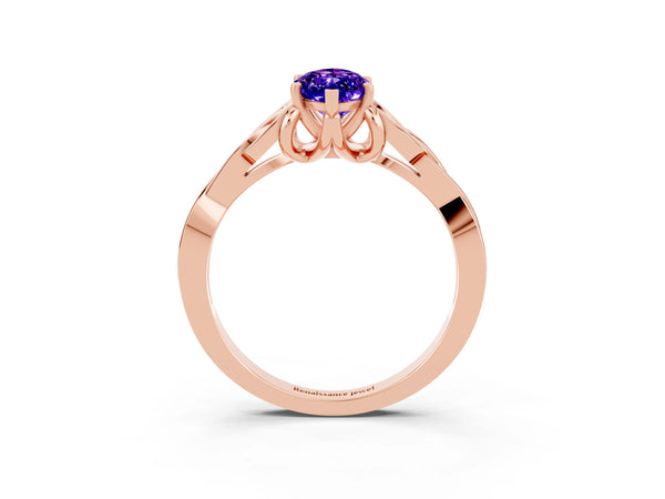 Rose gold Marquise Cut Tanzanite Solitaire Celtic Knot Ring with Four-Prong Setting