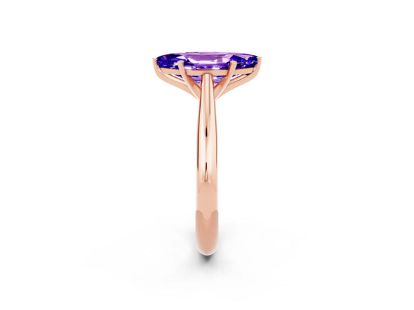 Rose gold Marquise Cut Tanzanite Solitaire Engagement Ring with Cathedral Setting and Four-Prong Mount