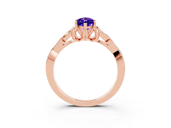 Rose gold Marquise Cut Tanzanite Solitaire Engagement Ring with Celtic Knot Band and Four-Prong Setting