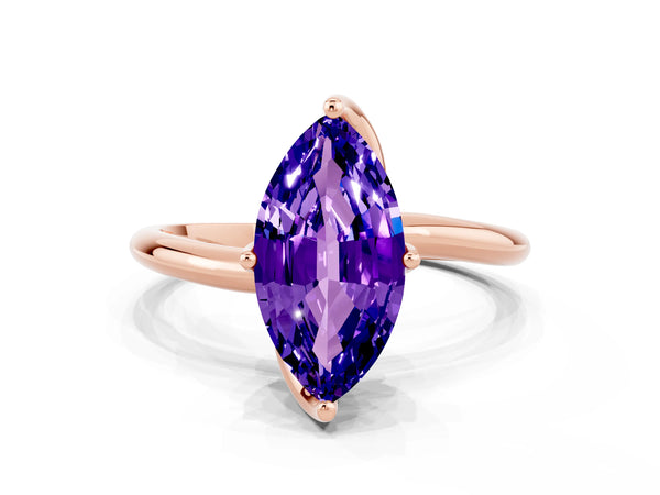 Rose gold Marquise Cut Tanzanite Solitaire Engagement Ring with Four-Prong Setting and Classic Band