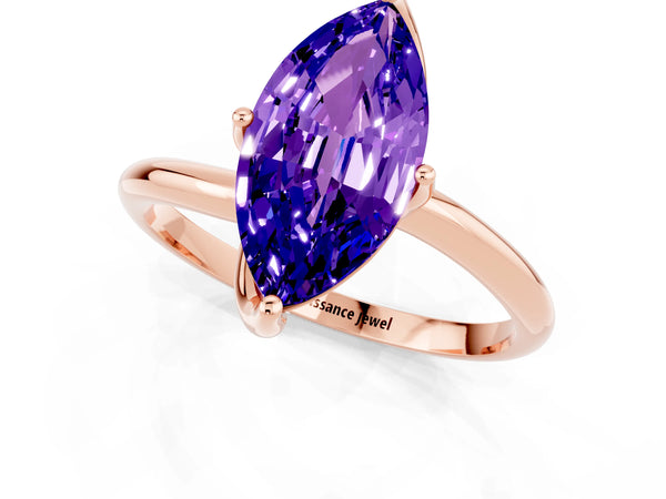 Rose gold Marquise Cut Tanzanite Solitaire Engagement Ring with Four-Prong Setting and Classic Band