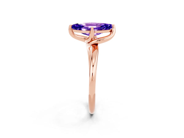 Rose gold Marquise Cut Tanzanite Solitaire Engagement Ring with Four-Prong Setting and Classic Band