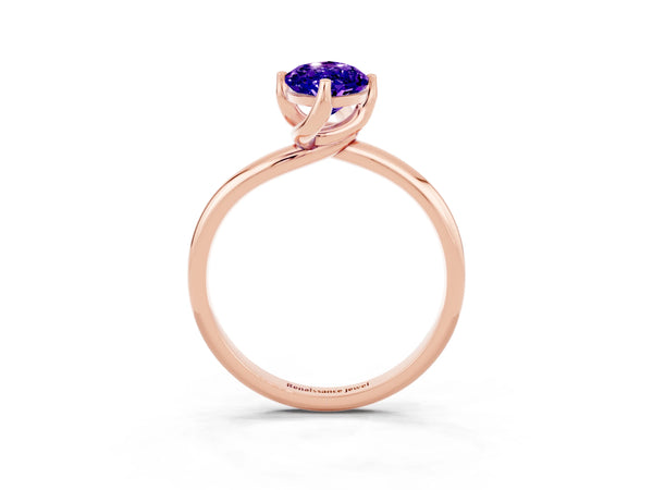 Rose gold Marquise Cut Tanzanite Solitaire Engagement Ring with Four-Prong Setting and Classic Band