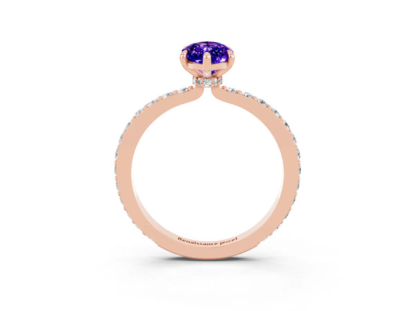 Rose gold Marquise Cut Tanzanite Solitaire Engagement Ring with Pavé Band and Four-Prong Setting