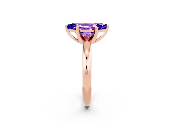 Rose gold Marquise Cut Tanzanite Solitaire Engagement Ring with Round Band and Four-Prong Setting