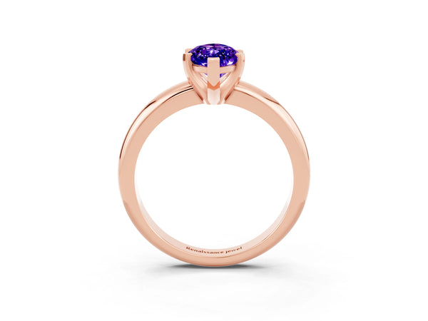Rose gold Marquise Cut Tanzanite Solitaire Engagement Ring with Round Band and Four-Prong Setting
