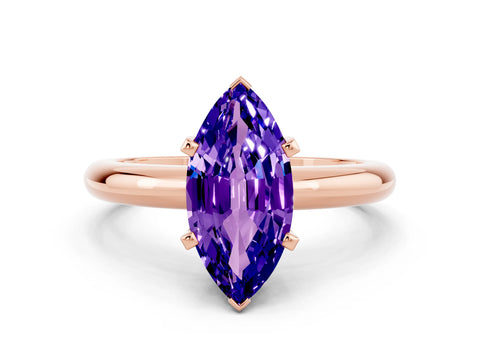 Rose gold Marquise Cut Tanzanite Solitaire Engagement Ring with Round Band and Four-Prong Setting