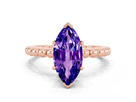 Rose gold Marquise Cut Tanzanite Solitaire Ring with Beaded Band and Prong Setting