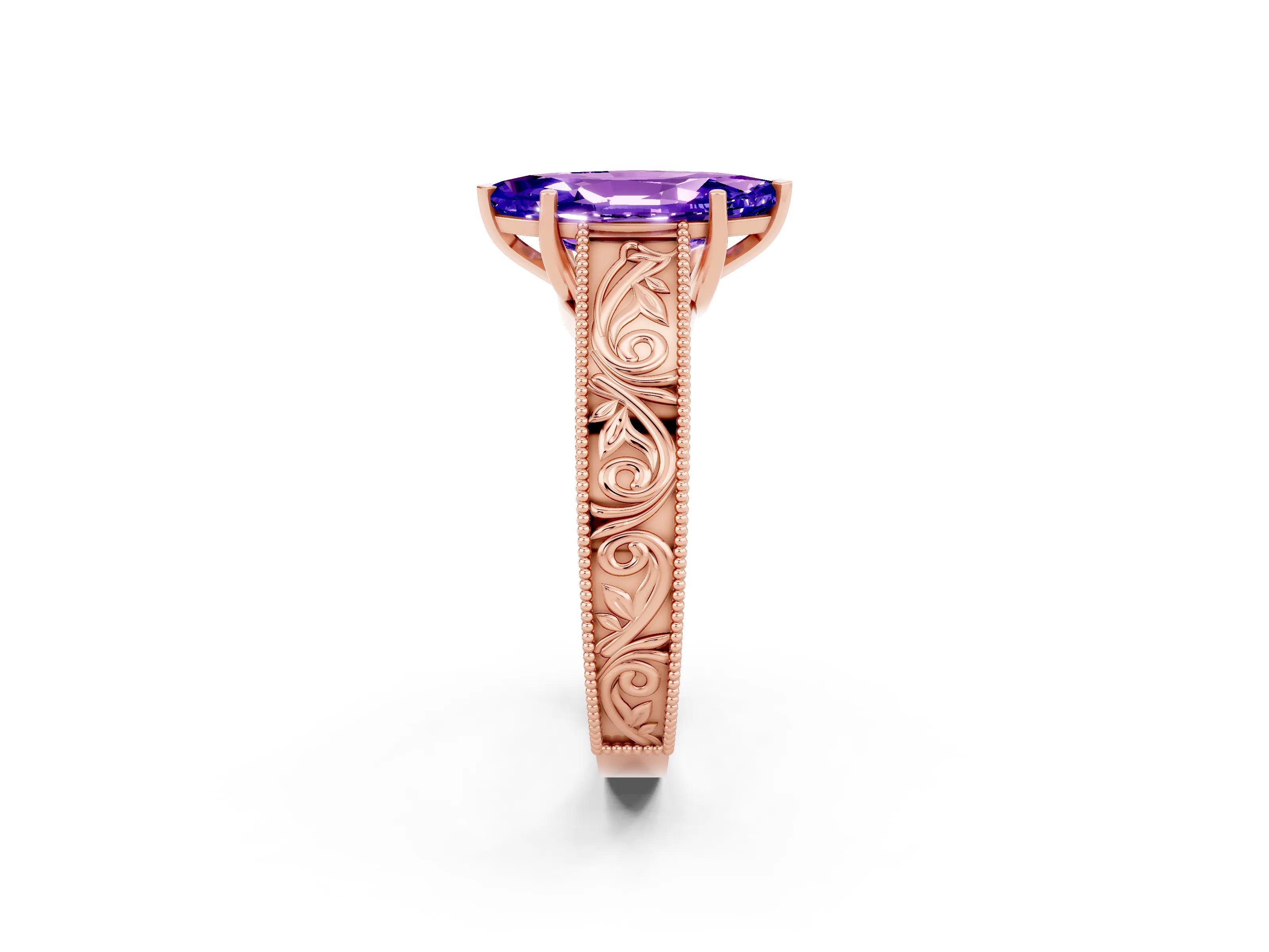 Rose gold Marquise Cut Tanzanite Solitaire Ring with Engraved Band and Four-Prong Setting_2