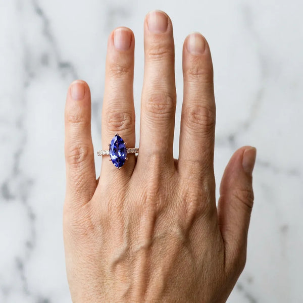 Rose gold Marquise Cut Tanzanite Solitaire Ring with Round  Pavé Band and Four-Prong Setting