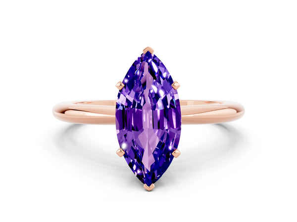 Rose gold Marquise Cut Tanzanite Solitaire Ring with Six-Prong Setting and Classic Band