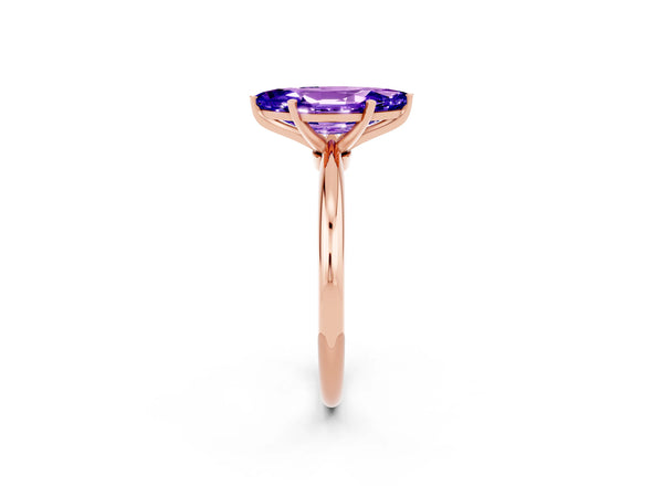 Rose gold Marquise Cut Tanzanite Solitaire Ring with Six-Prong Setting and Classic Band