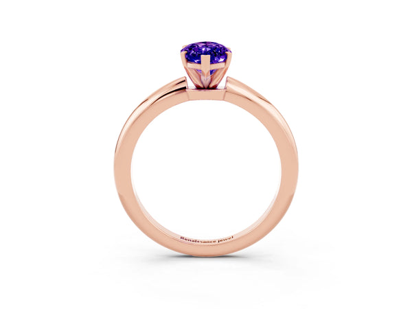 Rose gold Marquise Cut Tanzanite Solitaire Ring with Six-Prong Setting and Classic Band