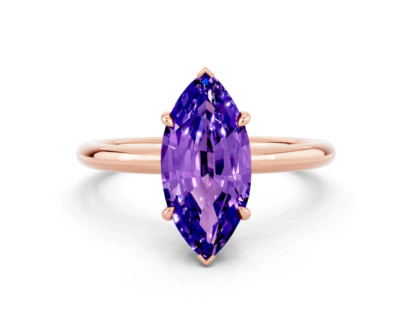 Rose gold Marquise Cut Tanzanite Solitaire Ring with Thin Band and Four-Prong Setting
