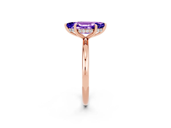 Rose gold Marquise Cut Tanzanite Solitaire Ring with Thin Band and Four-Prong Setting