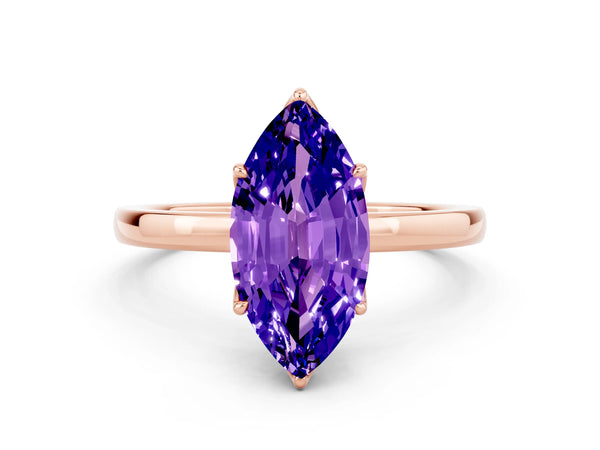 Rose gold Marquise Cut Tanzanite Solitaire Ring with Thin Band and Prong Setting