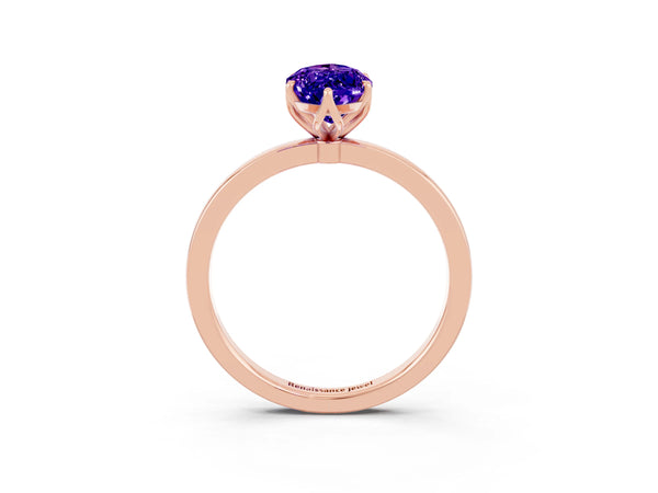 Rose gold Marquise Cut Tanzanite Solitaire Ring with Thin Band and Prong Setting