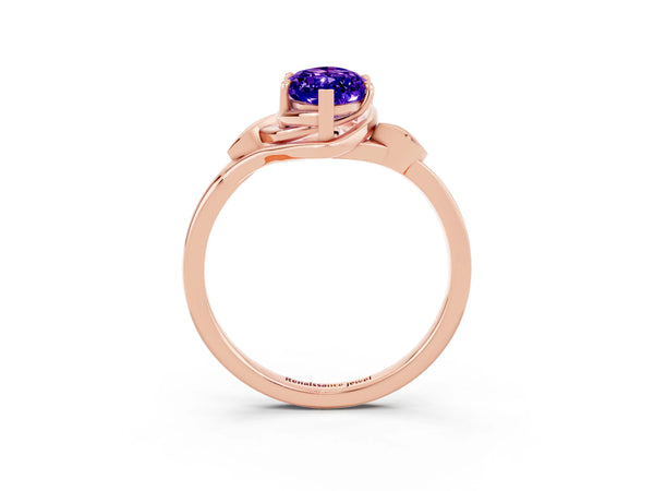 Rose gold Marquise Cut Tanzanite Solitaire Ring with Twist Band and Four-Prong Setting